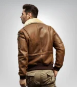 Stylish men's brown bomber jacket with embroidered design and shearling lining