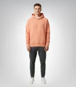 Stylish coral hoodie from Fear of God Essentials collection