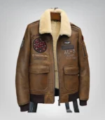 Brown embroidered shearling leather bomber jacket with fur collar