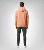 Unisex limited edition FOG Essentials hoodie in coral