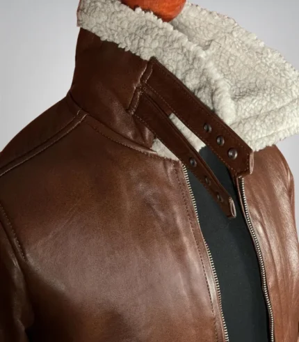 Vintage-style brown leather bomber jacket with warm shearling interior