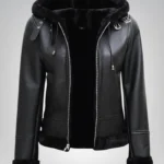 Alt Text: Stylish women’s hooded shearling jacket in black genuine leather