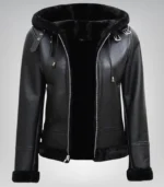 Alt Text: Stylish women’s hooded shearling jacket in black genuine leather