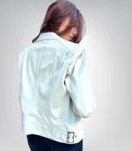 Elegant women’s beige sheepskin moto jacket with zipper details