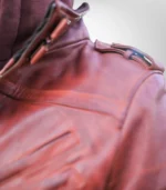 Close-up view of hood design and stitching details on men’s tan bomber leather jacket