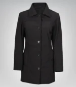 Alt Text: Elegant women’s black lightweight car coat with button closure, mid-length design