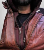 Inside view showing soft polyester lining of men’s tan hooded lambskin leather bomber jacket