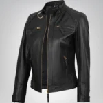 Women’s black leather moto-style jacket with gold accents