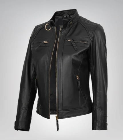 Women’s black leather moto-style jacket with gold accents