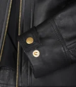 Women’s genuine black leather moto-style jacket with gold accents