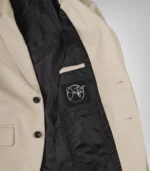 Stylish men’s beige leather blazer featuring two-button design and notch lapel