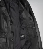 Stylish men’s black leather blazer featuring three-button design and traditional notch lapel