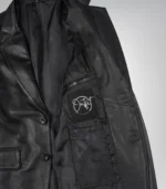 Stylish men’s black leather blazer featuring two-button design and notch lapel